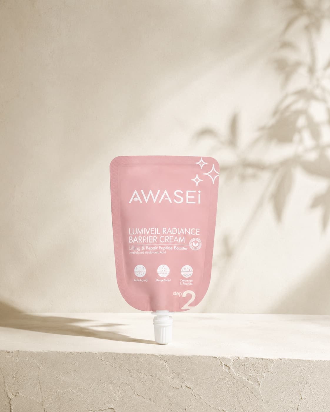 Awasei LUMIVEIL facial moisturiser on an ivory plaster shelf with leaf shadows